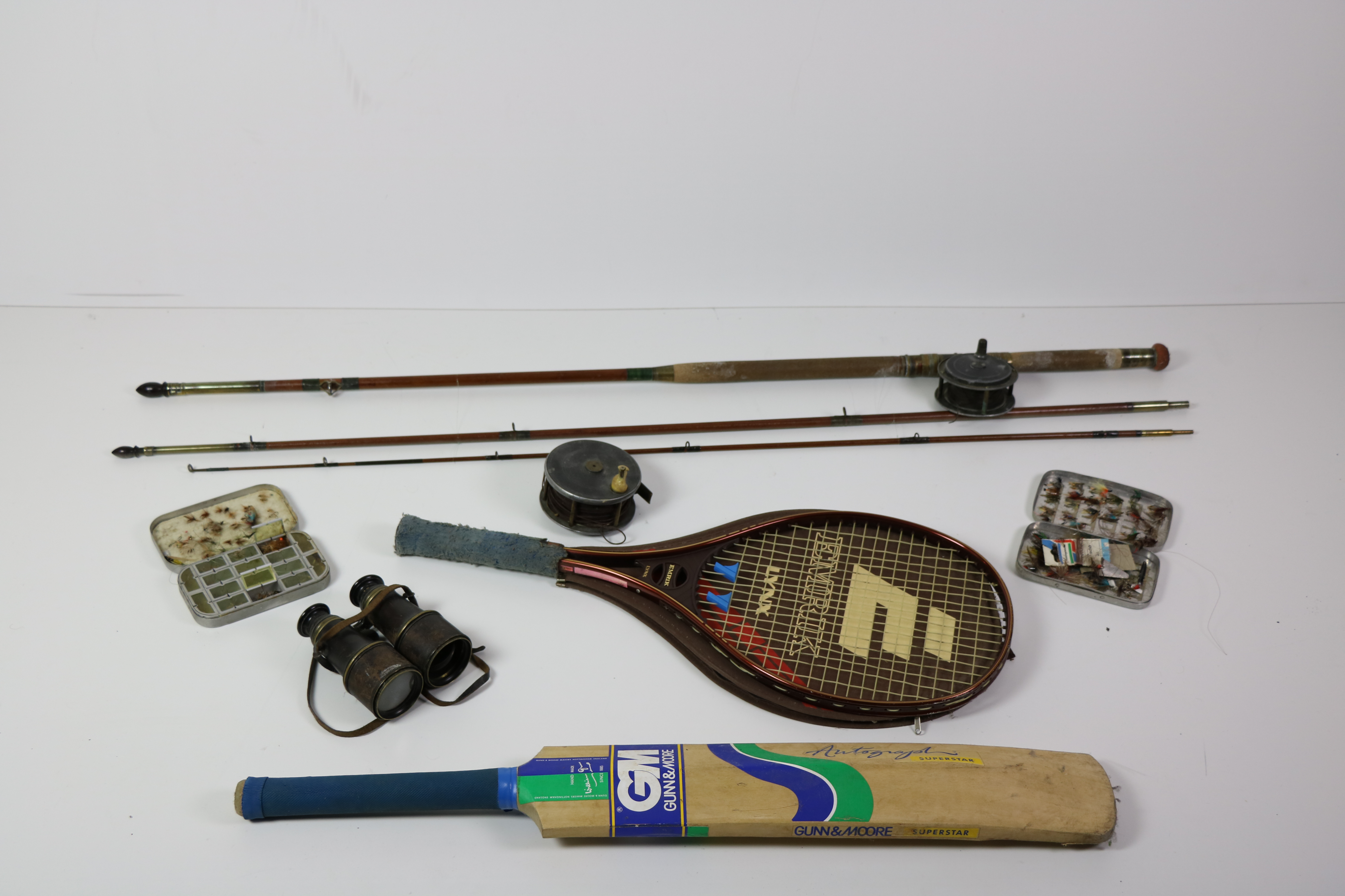 Two large late 19th Century three part Fishing Rods, with reels, and another large reel,