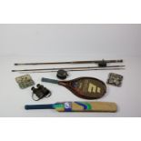 Two large late 19th Century three part Fishing Rods, with reels, and another large reel,