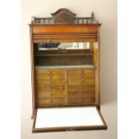 A very attractive late 19th Century figured walnut Dentist's hanging Wall Cabinet,