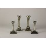 An attractive pair of English silver Corinthian style Candlesticks, in the Adams taste,