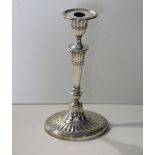 An single English silver single Candlestick, of elegant design with reeded body, London c.