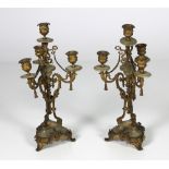 An attractive pair of 19th Century French ormolu and onyx marble three branch,