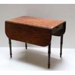 A 19th Century mahogany drop-leaf Table,