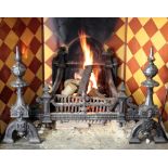 An attractive heavy polished metal antique Fire Grate, in the restauration style,