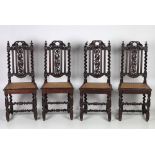 A set of four carved oak Jacobean Revival tall back Chairs, with barley twist supports etc.