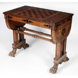 A Regency period walnut inlaid Games Compendium, in the manner of George Bullock,