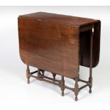 An Edwardian mahogany Yacht Table,