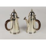A plain silver Argyll, with wooden handle and a matching Hot Water Jug with wooden handle, en suite,