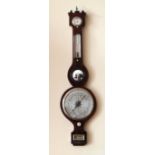 A good early 19th Century inlaid mahogany Wheel Barometer,