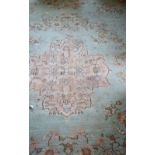 A large Oriental woolen Carpet,
