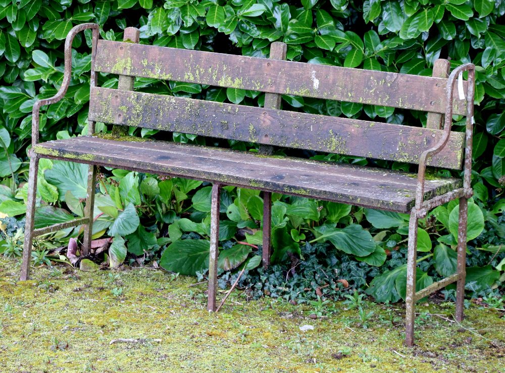 Two metal Garden Benches, with wooden seats and backs.