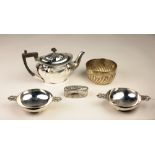 A pair of matching Bowls, of low proportions, with pierced handles; a small silver Teapot,