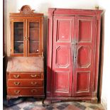 An antique painted pine two door Cupboard, with carved panels,