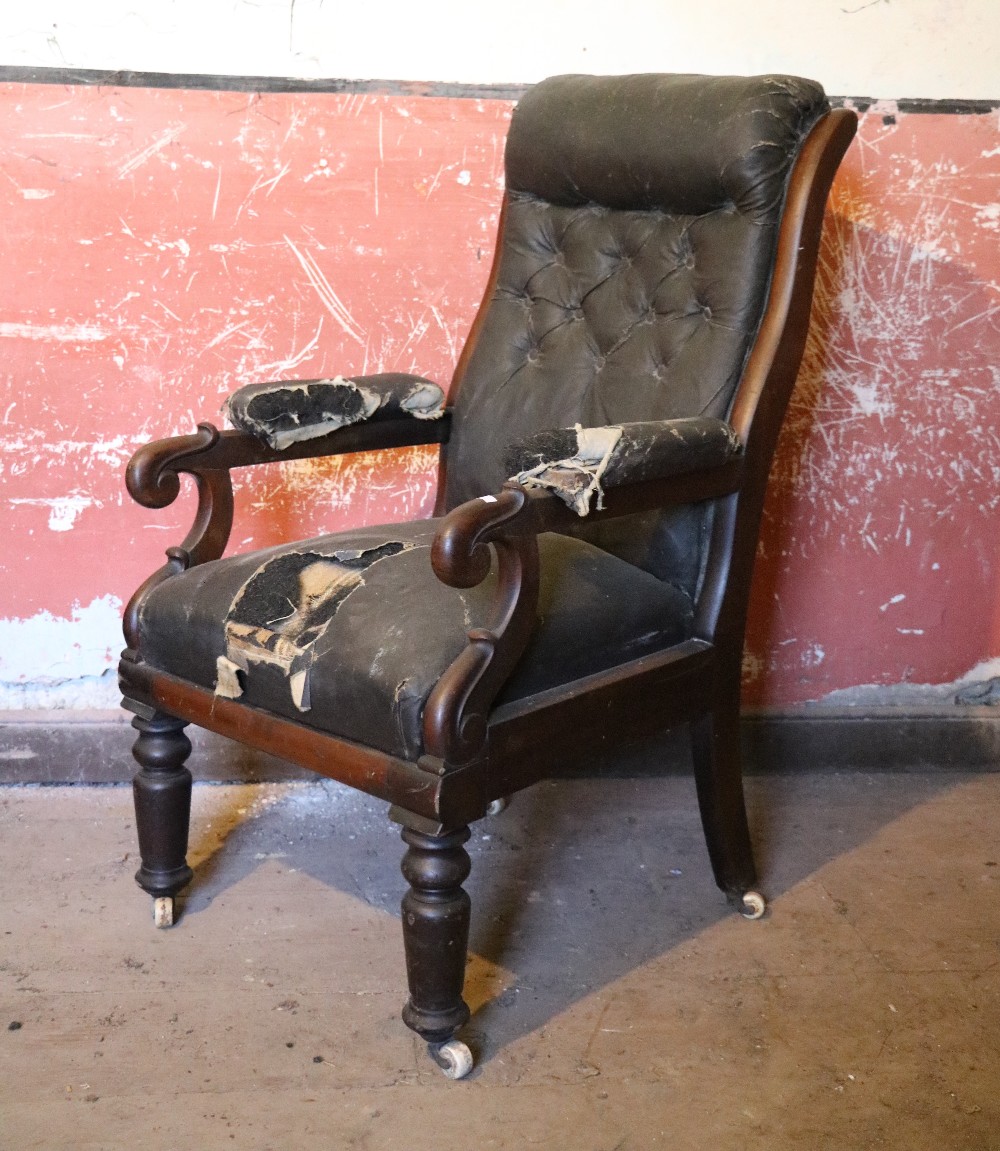 A good quality heavy carved William IV period mahogany Armchair, with deep buttoned back,