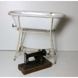 A Singer Table Sewing Machine, also a smaller ditto, an unusual enamel Child's Bath with tap outlet,