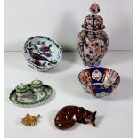 An Imari type Jar and Cover, two floral Potpourri Bowls, a porcelain model of a Fox,