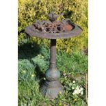 An antique cast metal Bird Bath, with gadroon edge, birds and pillar base, approx. 81cms (32") high.