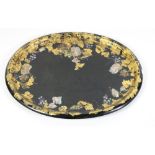 A large oval lacquered gold decorated Serving Tray,