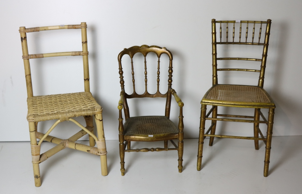 Two 19th Century giltwood Chairs, with cane seats, a pair of súgan type Cane Chairs,