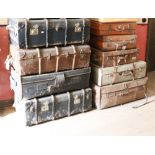 A large collection of leather cases, trunks, costume boxes etc.