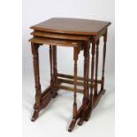 An attractive mahogany nest of three Tables, with turned pillar uprights.