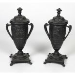 A pair of bronzed metal two handled Urns & Covers, 34cms (13 1/2") high.