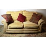 A good quality three piece modern Chesterfield Suite, in yellow material.