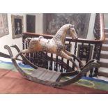 A large Victorian period painted wooden Rocking Horse, approx.