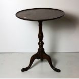 A quality small 19th Century mahogany dish top Occasional Table, on turned support and tripod base.