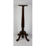 A 19th Century mahogany Pedestal Stand, with reeded pillar on four outsplayed legs, approx.
