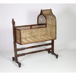 A 19th Century Irish mahogany framed and wicker work Children's Cradle by George Gillington of