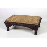 A 19th Century oak oblong yellow upholstered Foot Stool,