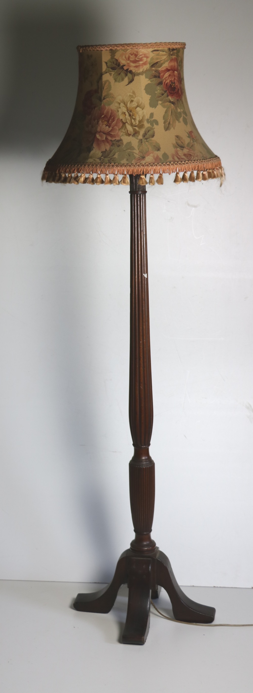 A mahogany Standard Lamp,