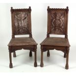 A pair of 19th Century carved oak Hall Chairs, of Architectural design, in the style of Pugin,