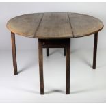 A George III period faded mahogany elliptical double drop leaf Hunting Table,