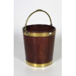 A fine quality Irish Georgian mahogany brass bound Peat Bucket, with decorated brass handles,