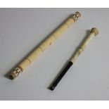 An ivory Swagger Stick Handle, together with a decorated ivory Baton.