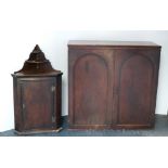 A 19th Century mahogany Wardrobe Top, with arched panel doors, approx.