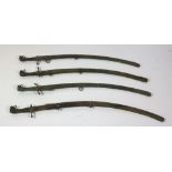 A set of 4 matching 19th Century steel Sabres, with original scabbards and lion mask handles.