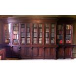 A large and impressive Victorian period stained pine breakfront Bookcase,