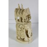 A 19th Century Chinese ivory Carving of an Elephant, in ceremonial attire carrying figures, approx.