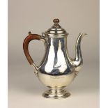 This Lot is Withdrawn A plain English silver Coffee Pot, with wooden handle, inscribed,