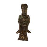 An early (possibly 17th Century) Chinese bronze and gilt highlighted Buddha or Deity Figure,