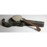 A late 19th Century Banjo, by T.E. Bevan & Co., Calcutta, in original case.