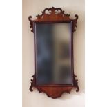A 19th Century mahogany framed and pierced decorated Wall Mirror, approx. 88cms (34 1/2).