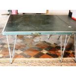 A modern standard size folding Table Tennis Table.
