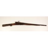 An antique Wheellock Rifle, dam; remains of a Flintlock Rifle,