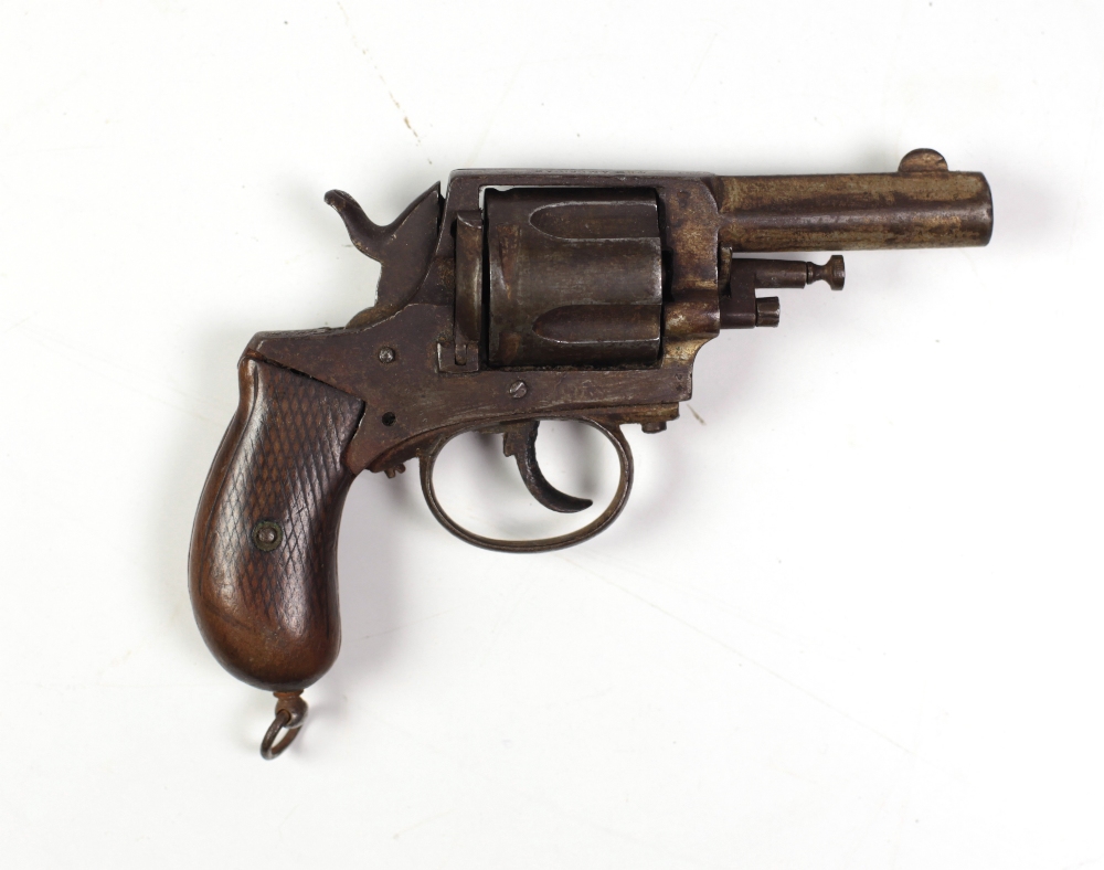 An antique Smith & Wesson "The American Bullock" Revolver, with honeycomb design and wooden handle.