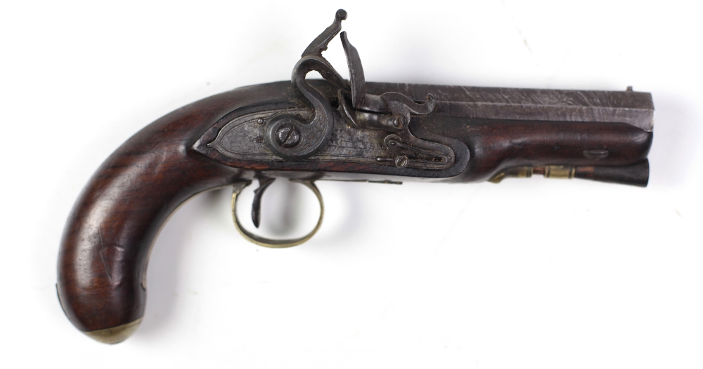 An early 19th Century flintlock Pistol, by Tomlinson of Dublin, with damascus octagonal barrel,