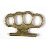 A Victorian period brass Knuckle Duster, with mark BC42.